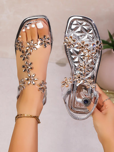 A pair of women's square-toe flat sandals, stylish silver sandals adorned with floral decorations - LKBA