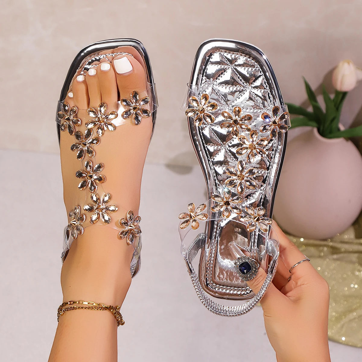A pair of women's square-toe flat sandals, stylish silver sandals adorned with floral decorations - LKBA